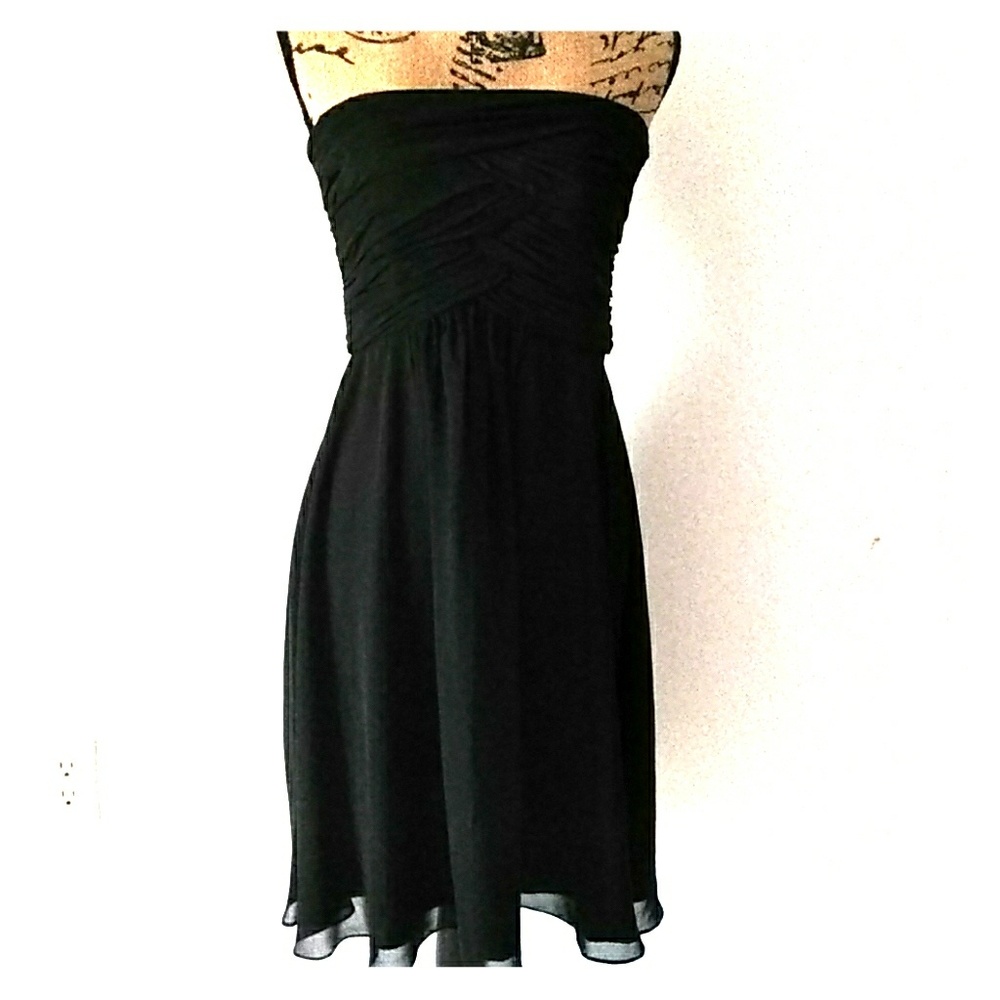 Flowing black calf length dress